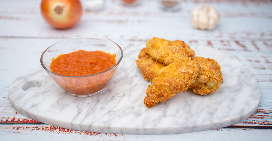 Alitas de pollo crujiente a l’Air Fryer con salsa de tomate picante