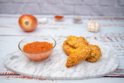 Alitas de pollo crujiente a l’Air Fryer con salsa de tomate picante